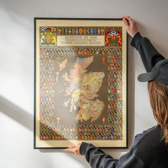 1975 Map of Scotland of Old being hung on a wall in a black frame