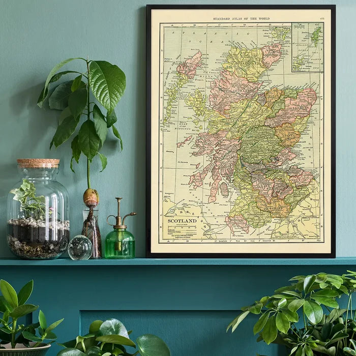C. S. Hammond map of Scotland black framed on a living room shelf