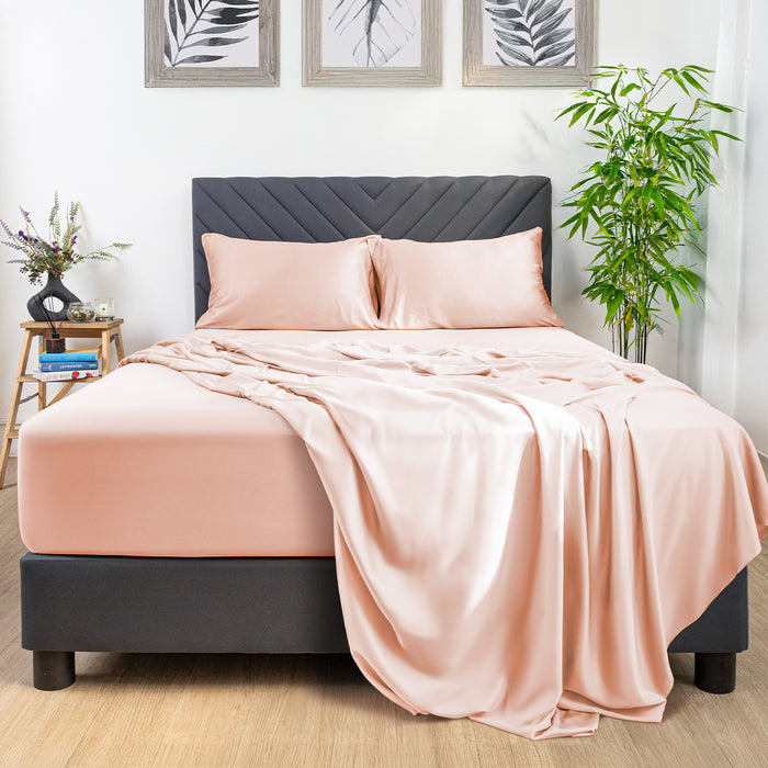Eco Deluxe Bed Linens 4 Piece Flat Sheet Set in peach and cream, shown in a room setting