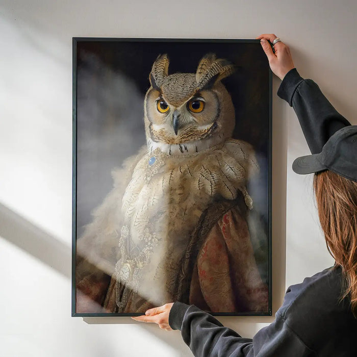 Owl Lady Animal Bird Portrait Print being hung on a wall in a black frame