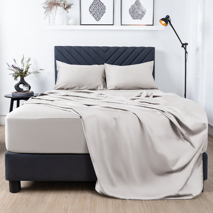 Premium Touch Bed Linens 4 Piece Flat Sheet Set in gray, shown in a room setting